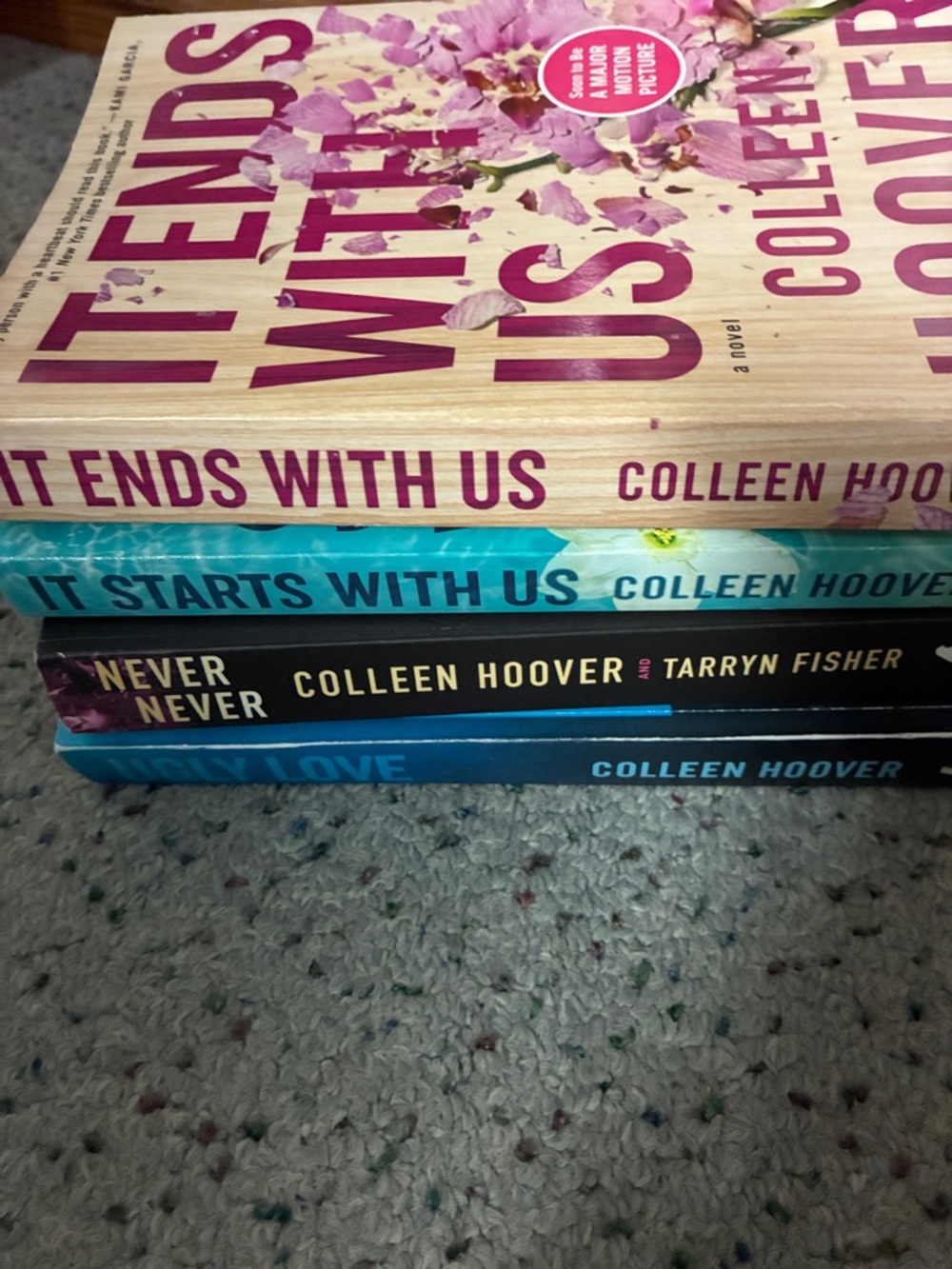 Paperback Book Stack - Pink, Teal, Black, Blue Spines